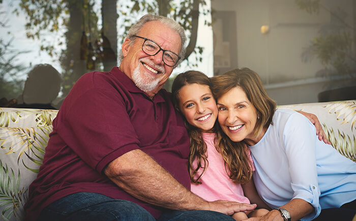 older couple with child